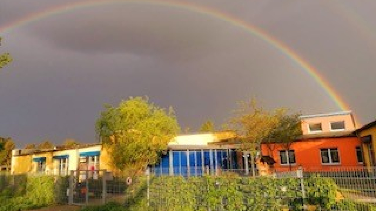 Unser Haus mit Regenbogen